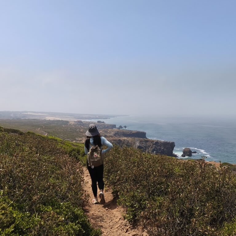 Group walking on the coastal path between Praia do Abano and Cabo da Roca.