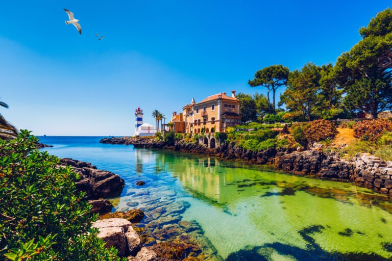 Santa Marta lighthouse and Municipal museum, Cascais, Lisbon, Portugal. Lighthouse Museum of Santa Marta in Cascais Portugal, as seen from Santa Marta Beach on a beautiful day. Cascais, Portugal.